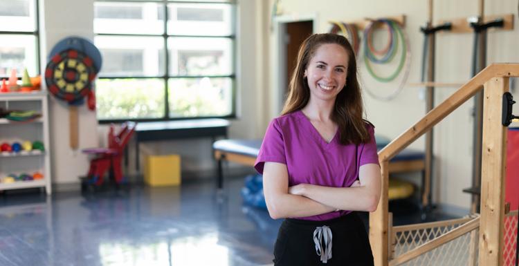 Caroline Locke, who earned bachelor's and master's degrees at the University of South Alabama, works with children in rehabilitation services at the Studer Family Children’s Hospital at Ascension Sacred Heart in Pensacola.  data-lightbox='featured'